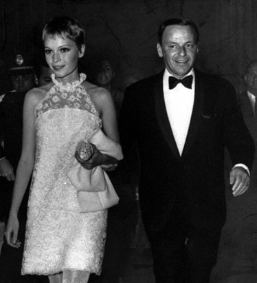 Mia Farrow walks with husband Frank Sinatra 